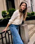 Let your outfit shine with this classic 'Vintage Whisker Wash' Braid Wide Leg Jean.