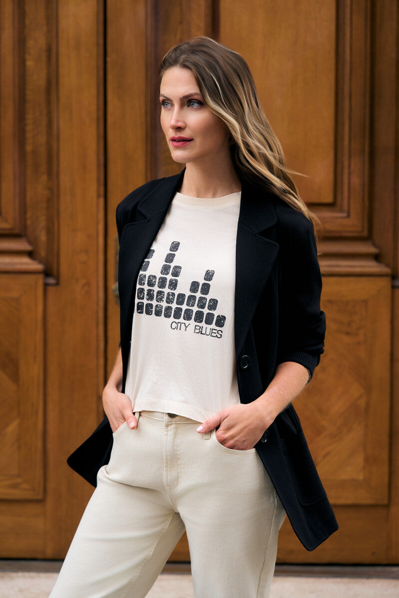 Bring your style to life with the 'Bone White' Coram Graphic T-Shirt – perfect for any occasion.