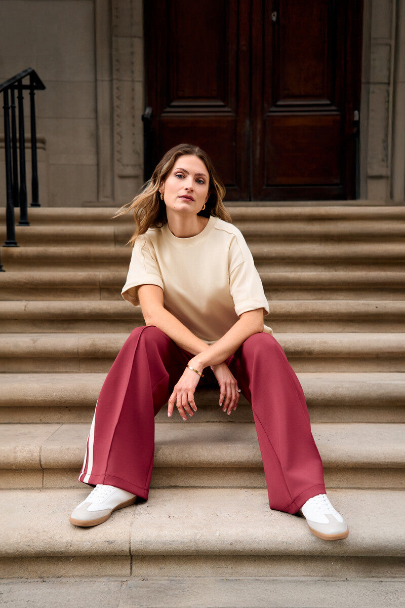 Add sophistication with the unique 'Maroon' Trouser Track Pant.