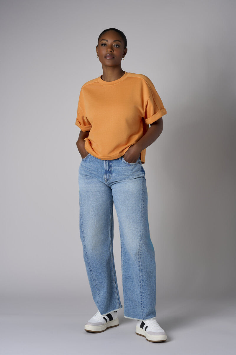 Experience the bold look of our 'Vintage Whisker Wash' Barrel Leg Jean.