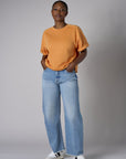 Experience the bold look of our 'Vintage Whisker Wash' Barrel Leg Jean.