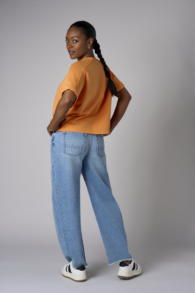 Experience the bold look of our 'Vintage Whisker Wash' Barrel Leg Jean.