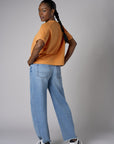 Experience the bold look of our 'Vintage Whisker Wash' Barrel Leg Jean.