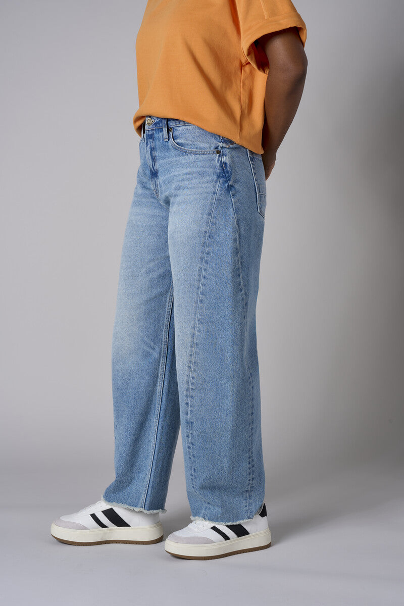 Experience the bold look of our 'Vintage Whisker Wash' Barrel Leg Jean.