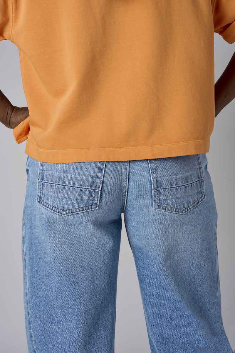 Experience the bold look of our 'Vintage Whisker Wash' Barrel Leg Jean.