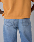 Experience the bold look of our 'Vintage Whisker Wash' Barrel Leg Jean.