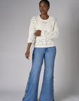 Let your outfit shine with this classic 'Vintage Whisker Wash' Braid Wide Leg Jean.