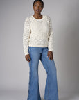 Let your outfit shine with this classic 'Vintage Whisker Wash' Braid Wide Leg Jean.