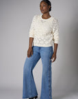 Let your outfit shine with this classic 'Vintage Whisker Wash' Braid Wide Leg Jean.