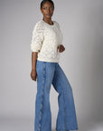 Let your outfit shine with this classic 'Vintage Whisker Wash' Braid Wide Leg Jean.