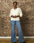 Let your outfit shine with this classic 'Vintage Whisker Wash' Braid Wide Leg Jean.