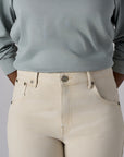 Make a statement in our refined 'Bone White Denim' Slim Barrel Leg Jean.