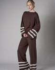 The 'Earth' Striped Leg Pant delivers both comfort and unique flair.