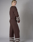The 'Earth' Striped Leg Pant delivers both comfort and unique flair.