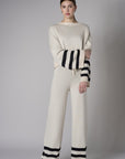 Step up your look with this unique 'Sand' Striped Leg Pant.