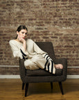 Step up your look with this unique 'Sand' Striped Leg Pant.