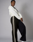 Create your signature style with our 'Black' Trouser Track Pant.
