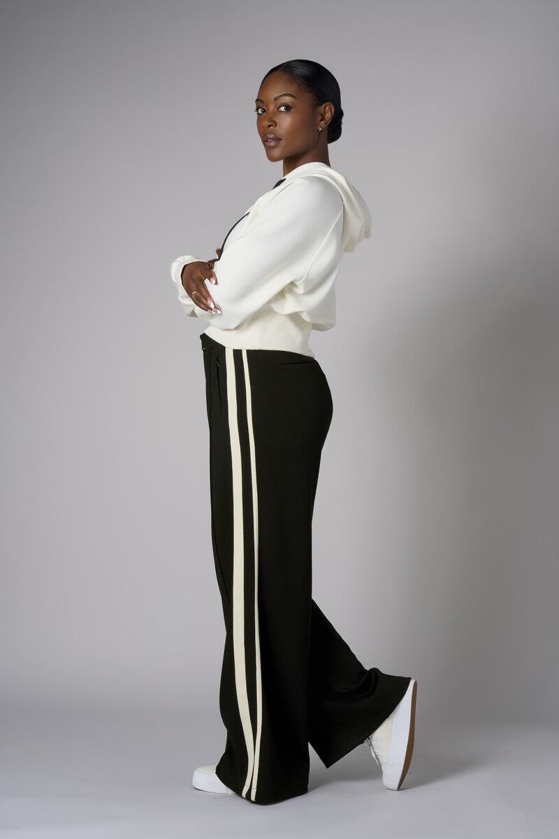 Create your signature style with our 'Black' Trouser Track Pant.