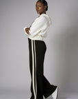 Create your signature style with our 'Black' Trouser Track Pant.