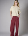Add sophistication with the unique 'Maroon' Trouser Track Pant.