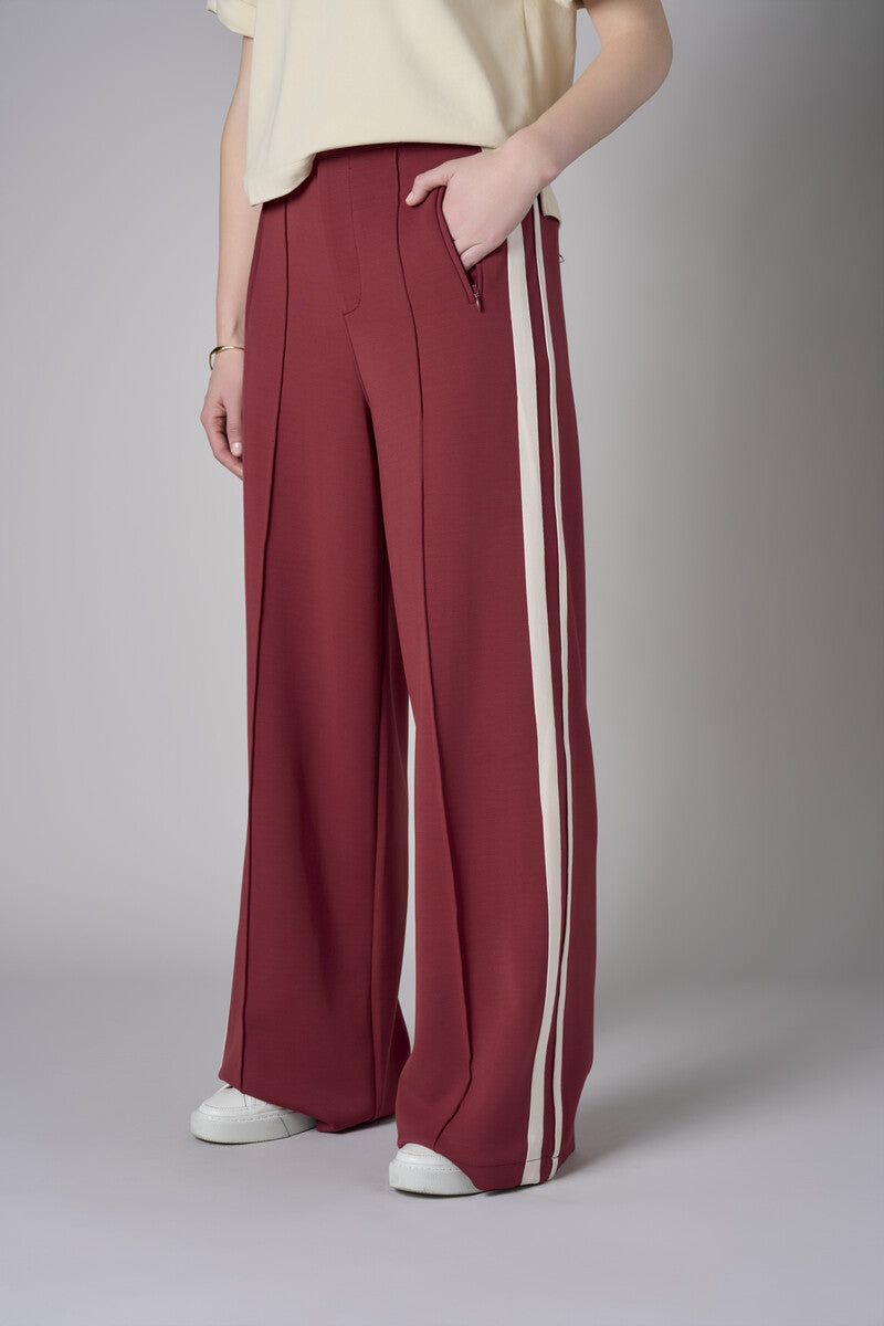 Add sophistication with the unique 'Maroon' Trouser Track Pant.