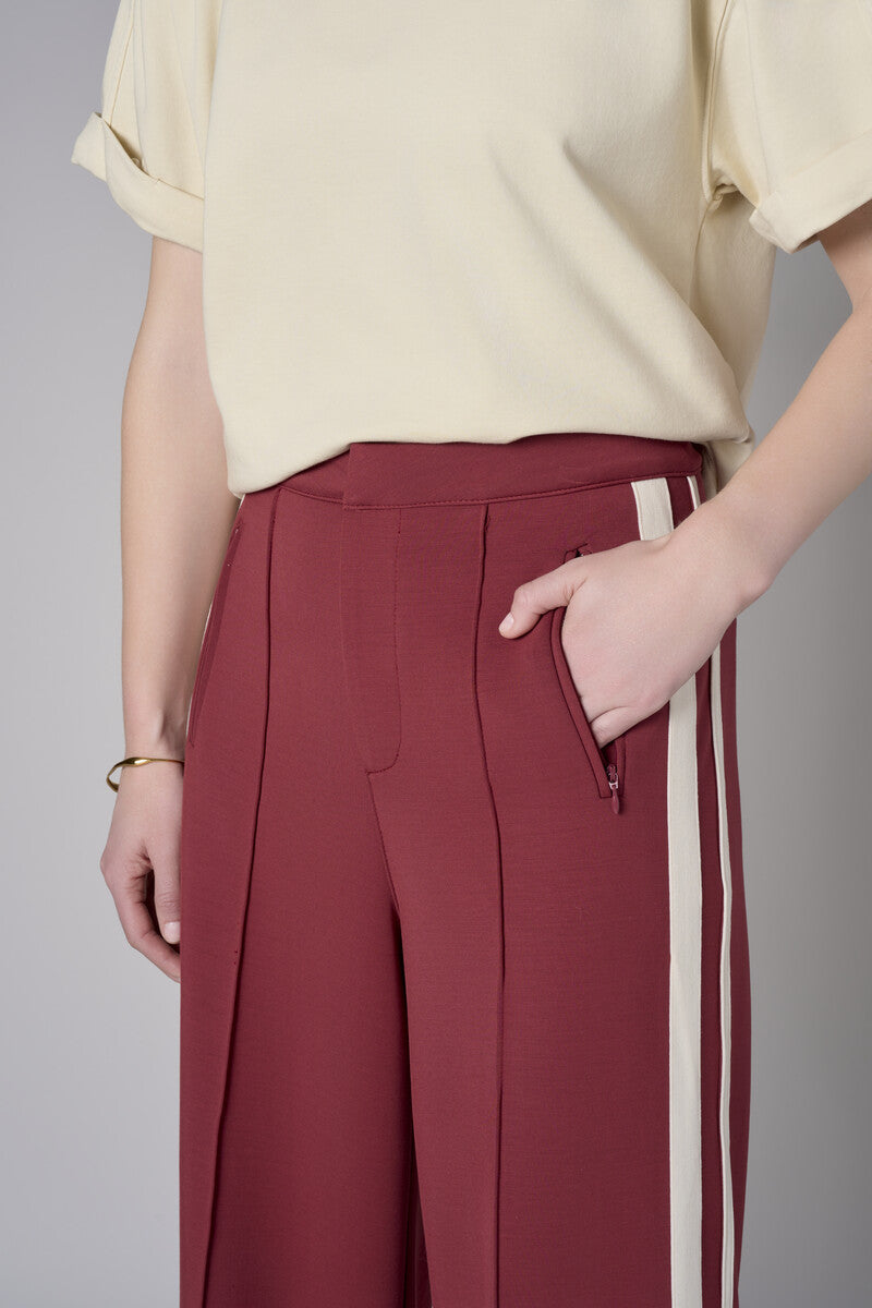 Add sophistication with the unique 'Maroon' Trouser Track Pant.