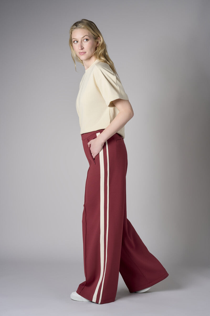 Add sophistication with the unique 'Maroon' Trouser Track Pant.