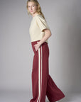 Add sophistication with the unique 'Maroon' Trouser Track Pant.