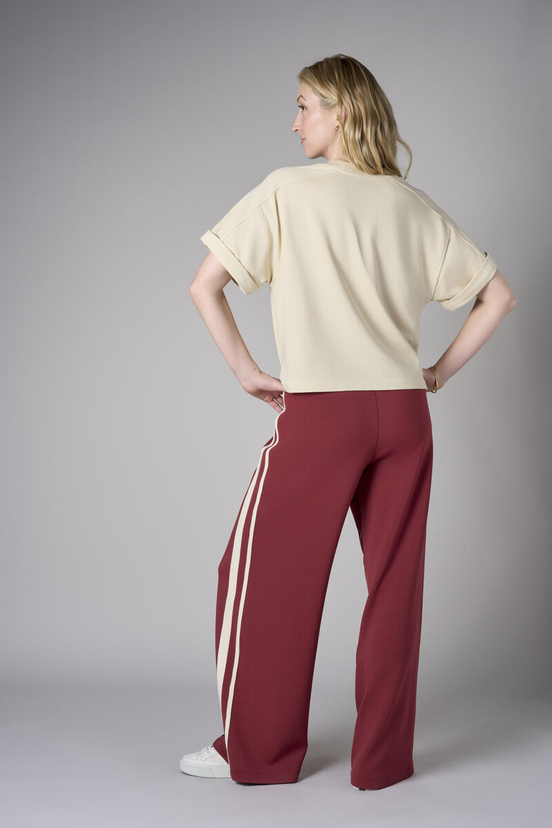 Add sophistication with the unique 'Maroon' Trouser Track Pant.