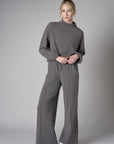 Turn heads with this modern 'Gray' Pintuck Lounge Pant.