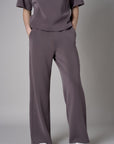 Add a pop of color to your look with the 'Dark Gray' Side Panel Athletic Pant.