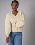Bring your style to life with the 'Bone White' Zipper Back V-Neck Sweatshirt – perfect for any occasion.