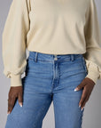 Bring your style to life with the 'Bone White' Zipper Back V-Neck Sweatshirt – perfect for any occasion.