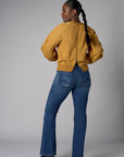 Be unforgettable in the elegant 'Marigold' Zipper Back V-Neck Sweatshirt.