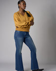 Be unforgettable in the elegant 'Marigold' Zipper Back V-Neck Sweatshirt.