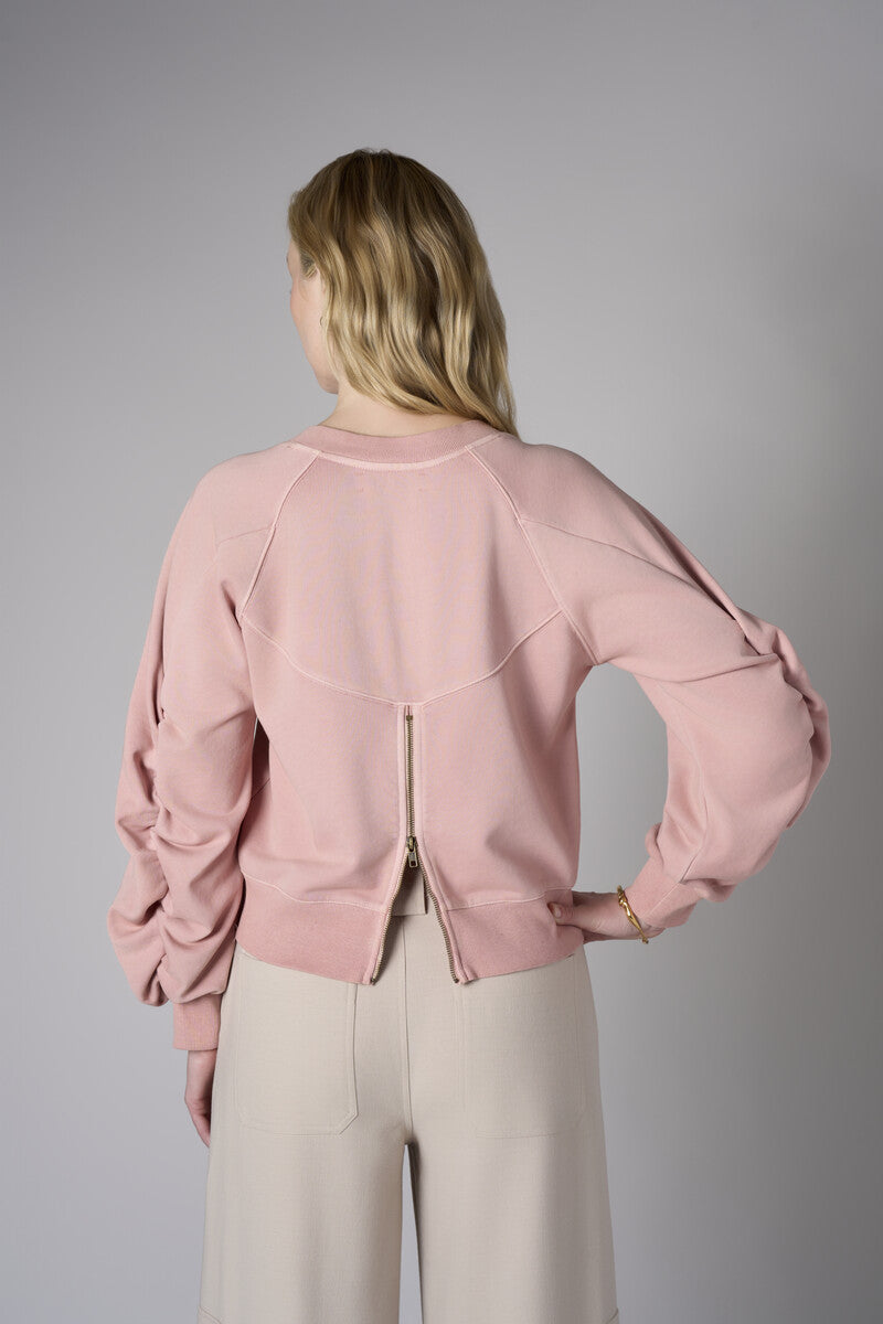 Experience the premium look of our 'Rose' Zipper Back V-Neck Sweatshirt.