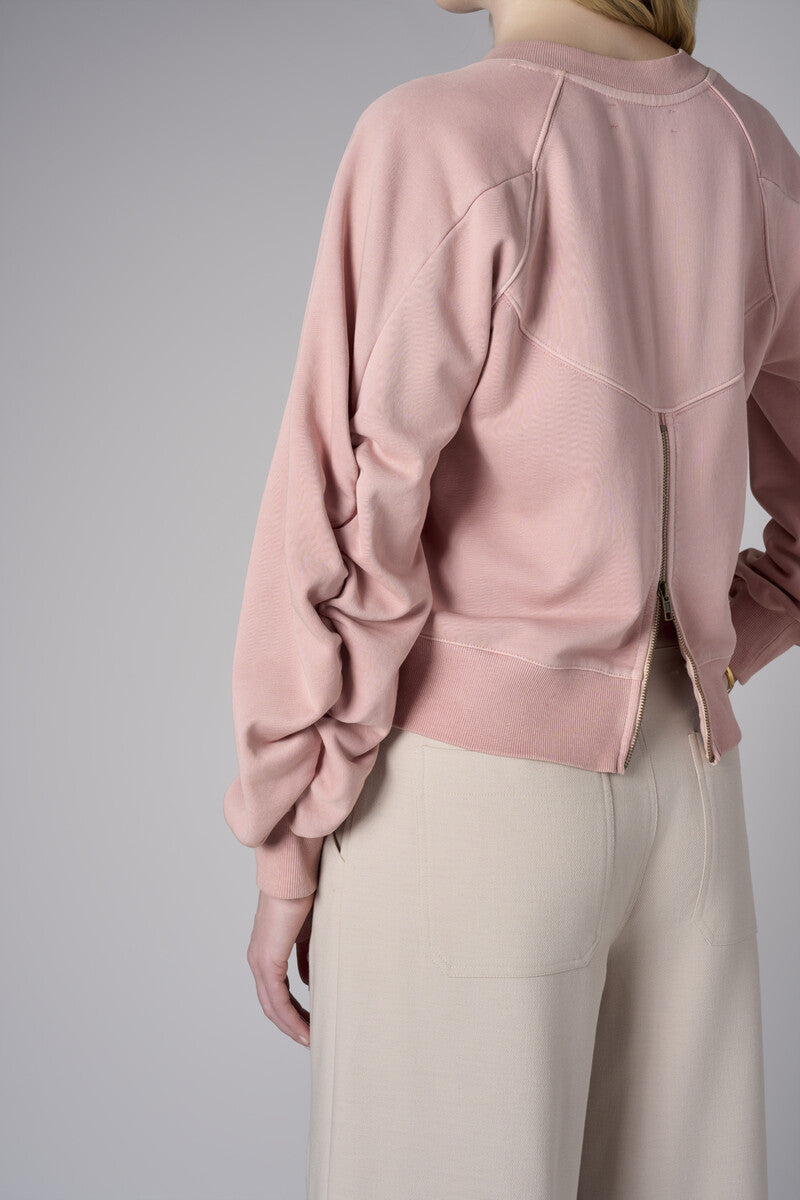 Experience the premium look of our 'Rose' Zipper Back V-Neck Sweatshirt.