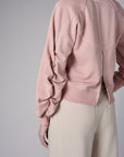 Experience the premium look of our 'Rose' Zipper Back V-Neck Sweatshirt.