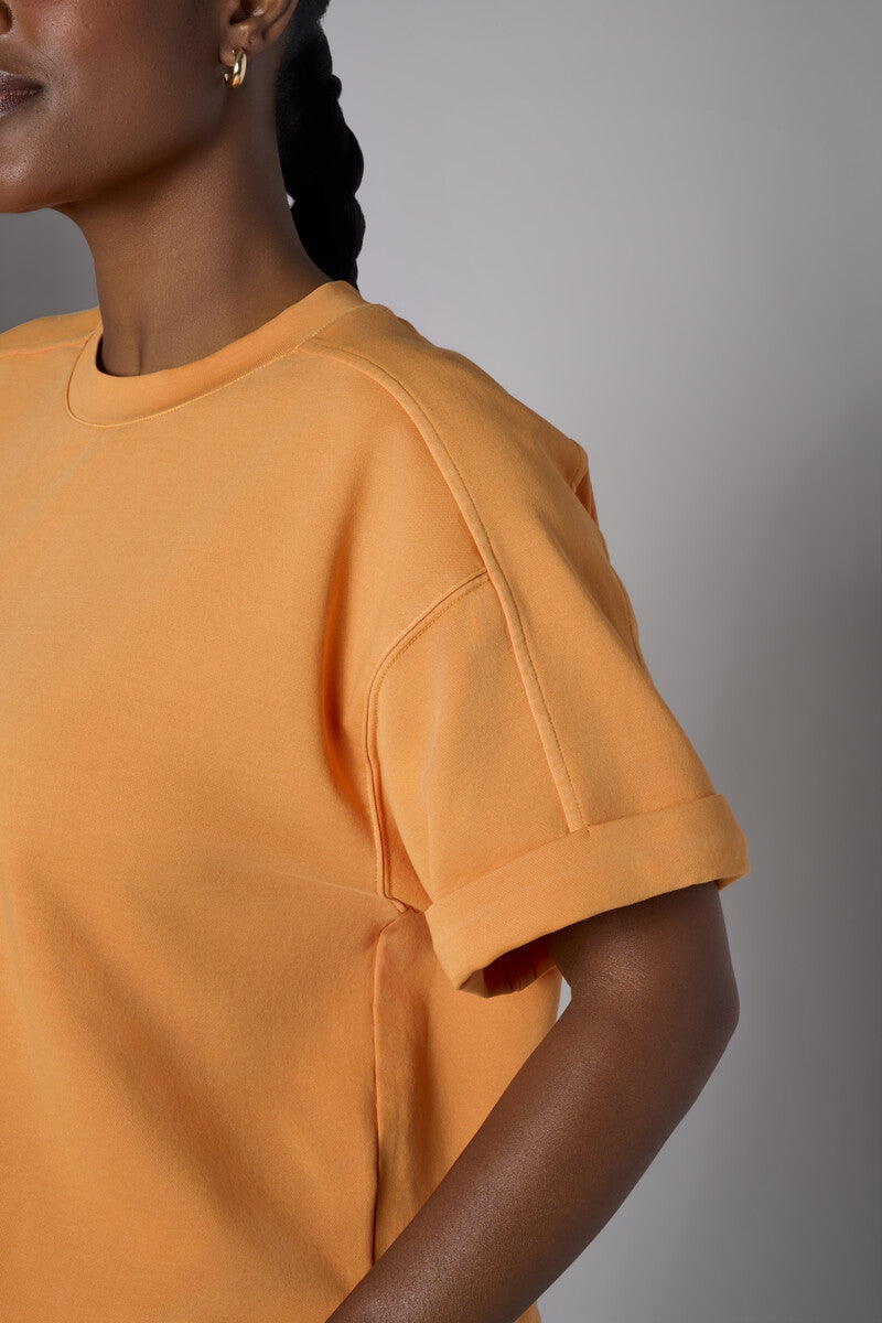 Step up your look with this unique 'Marigold' Brie Sweatshirt.