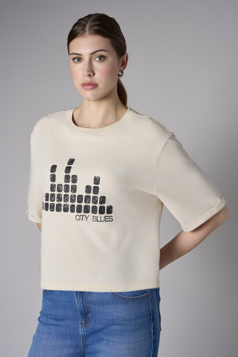 Bring your style to life with the 'Bone White' Coram Graphic T-Shirt – perfect for any occasion.
