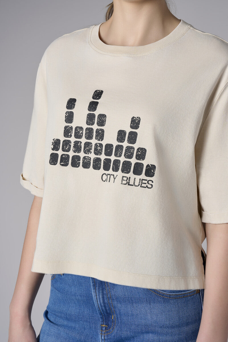 Bring your style to life with the 'Bone White' Coram Graphic T-Shirt – perfect for any occasion.