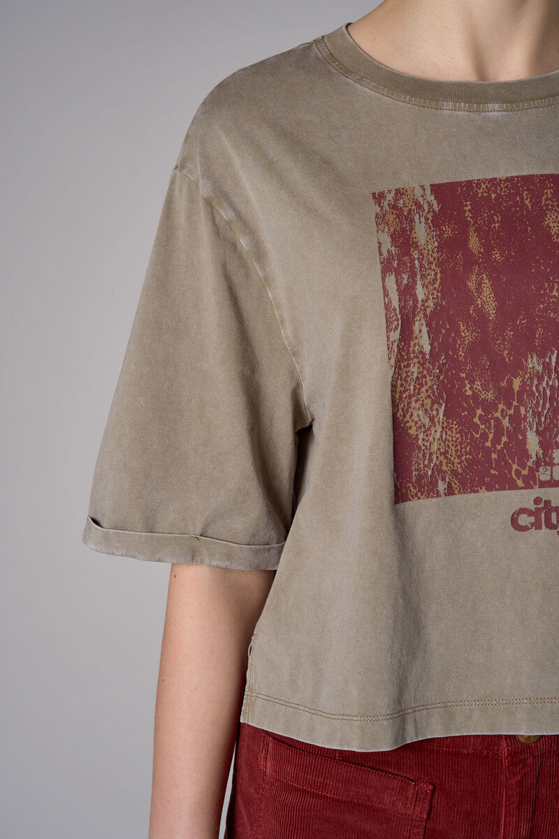 Bring your style to life with the 'Light Olive' Coram Graphic T-Shirt – perfect for any occasion.