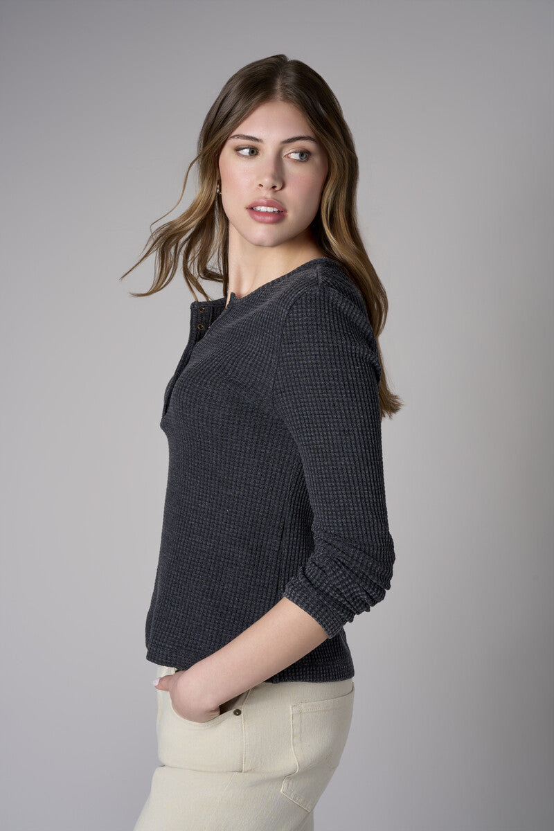 Bring your style to life with the 'Black' Henley Top – perfect for any occasion.