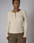Upgrade your collection with the fashion-forward 'Khaki' Henley Top.