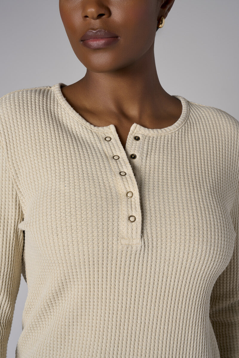 Upgrade your collection with the fashion-forward 'Khaki' Henley Top.