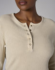 Upgrade your collection with the fashion-forward 'Khaki' Henley Top.