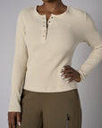 Upgrade your collection with the fashion-forward 'Khaki' Henley Top.