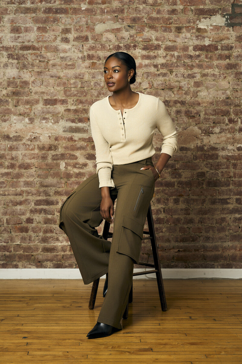 Upgrade your collection with the fashion-forward 'Khaki' Henley Top.