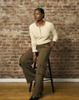 Upgrade your collection with the fashion-forward 'Khaki' Henley Top.