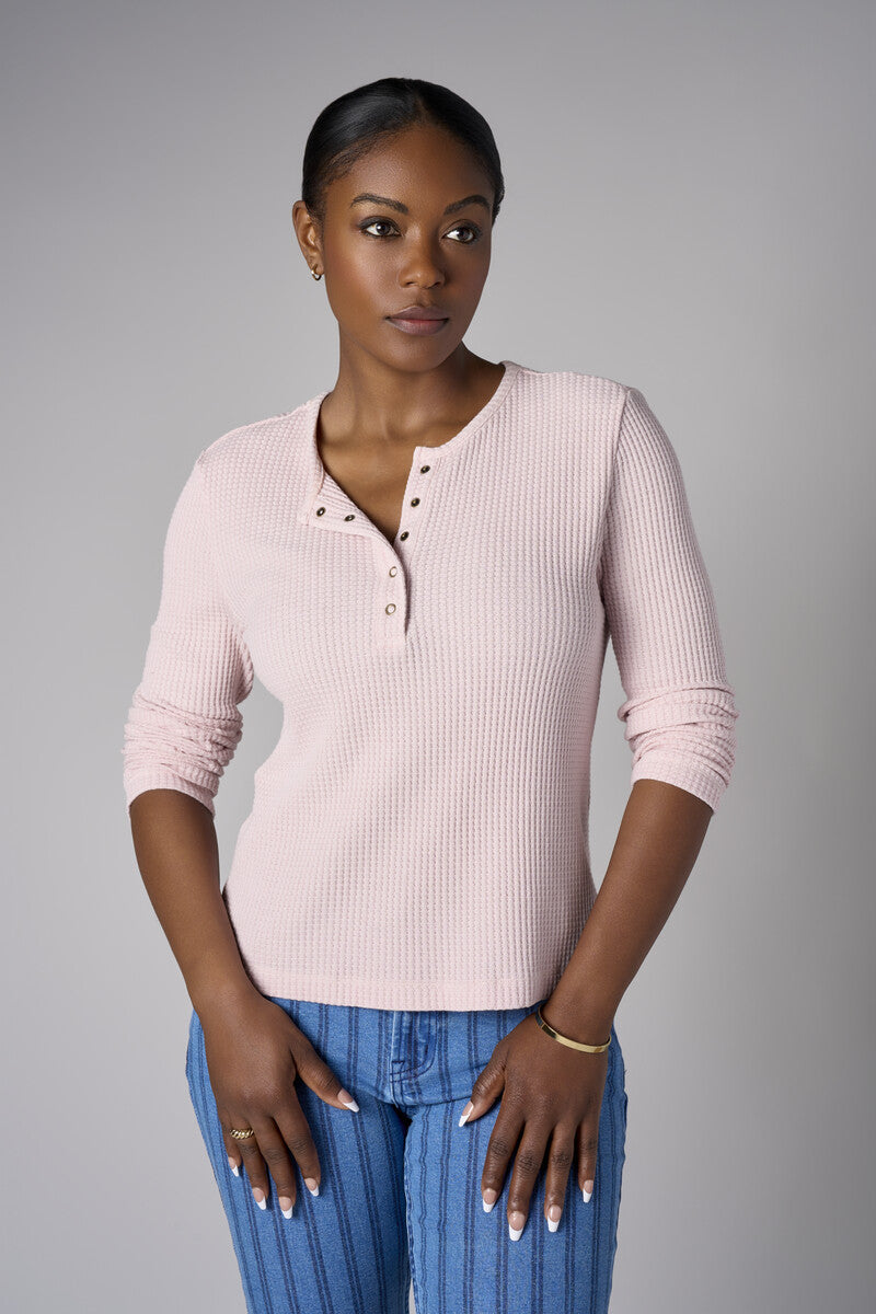 Feel fabulous every day in the 'Petal' Henley Top, crafted for those who love versatile style.